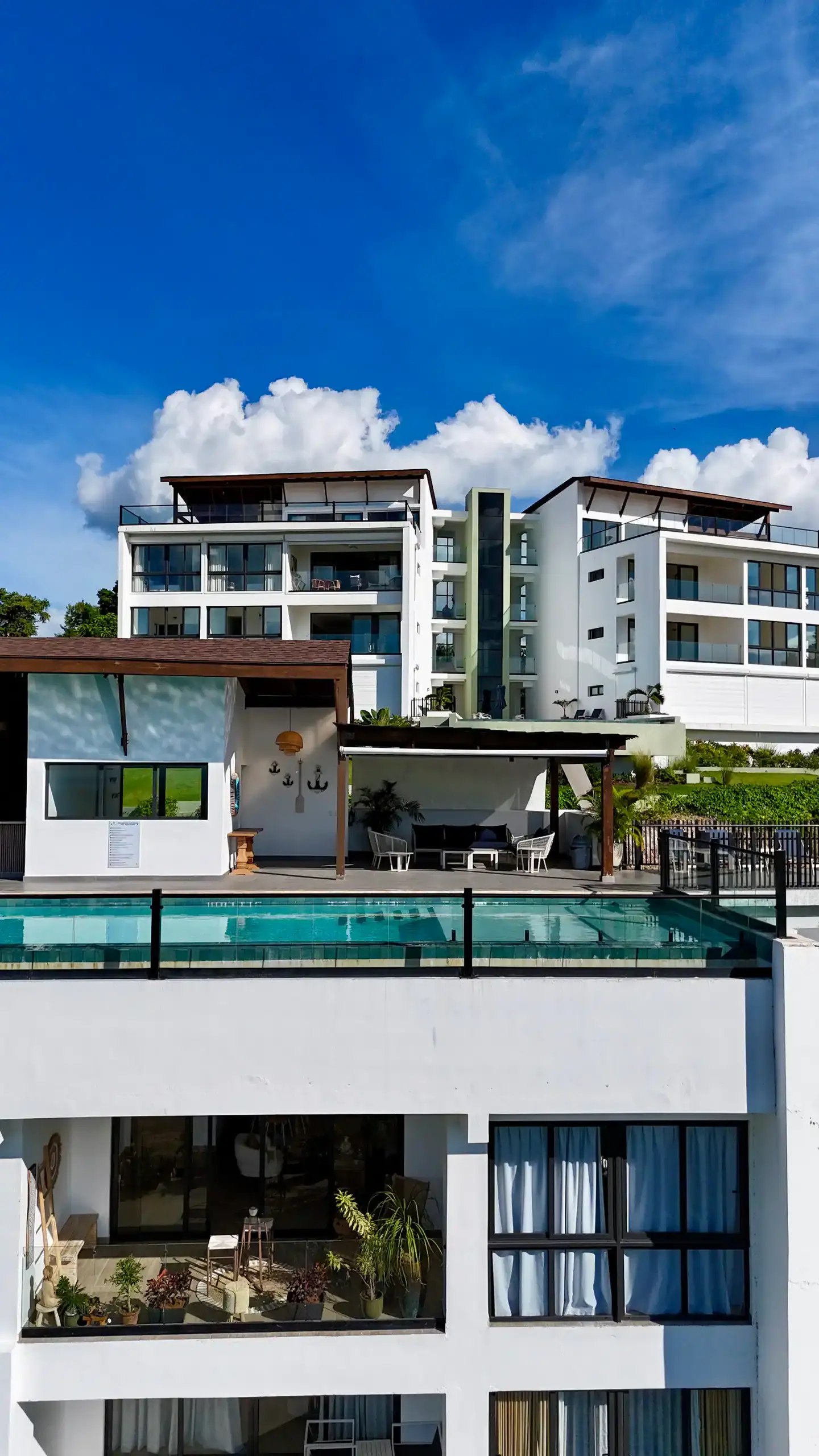 Pool deck with the residence in the background